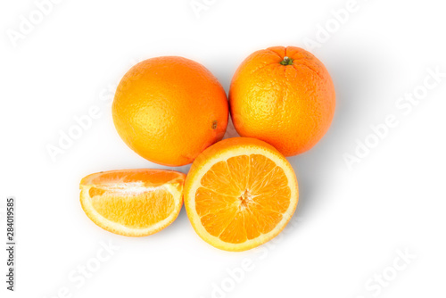Sliced oranges fruit segments isolated on white background Top view