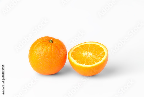 Sliced oranges fruit segments isolated on white background