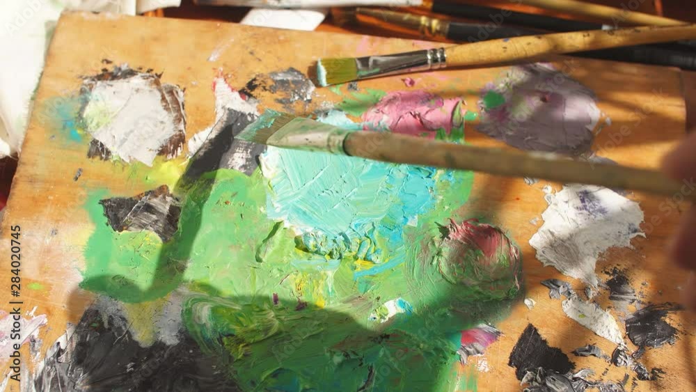 Artist diluting paint. Close up cropped video. Creative art Artist diluting paint. Close up cropped video. Creative art