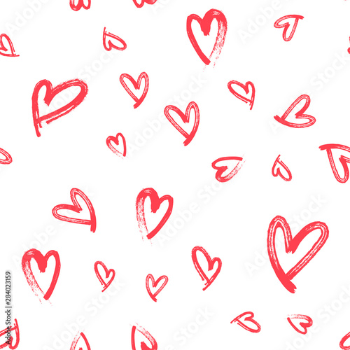Heart doodles seamless love pattern. Hand drawn brushed hearts. Background texture for valentine's day.