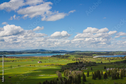  Beautiful summer landscape of Germany. View of Blue sky with white clouds, plain, mountains and lakes