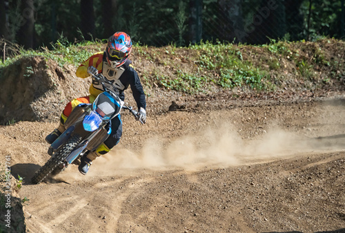 Motocross rider on a trail during a training