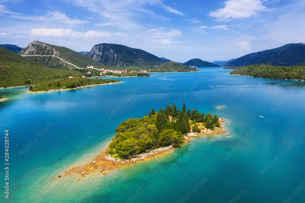 Croatia. Aerial view on islands. Vacation and adventure. Top view from drone at island and azure sea. Travel - image