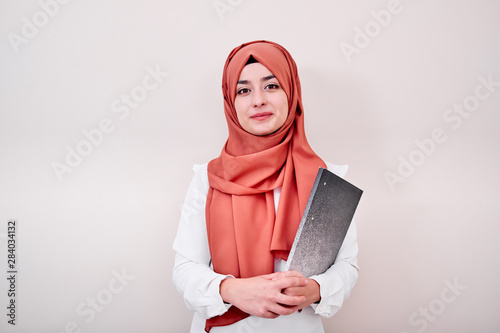 Young muslim teacher or student, back to school education concept photo