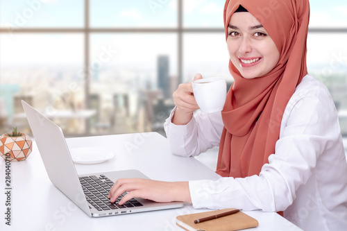 Hijab muslim woman work with computer  muslim girl work at office