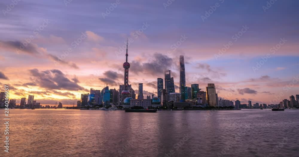Shanghai skyline and modern buildings at sunrise,time lapse.