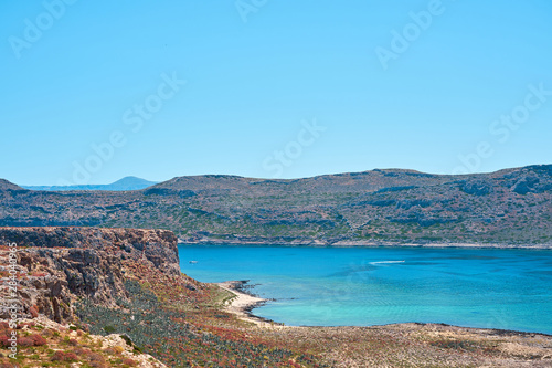                            Blue lagoon and tropical sea coast with sandy beach among islands on sunny day with clear blue sky in Crete  Greece.    