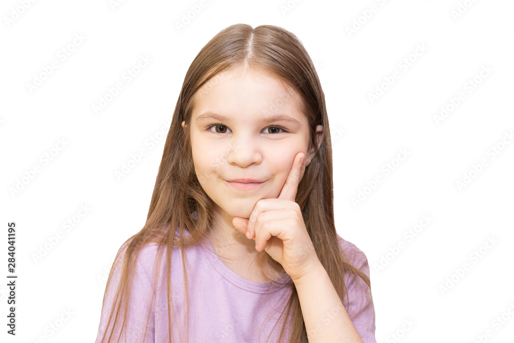 The little girl looks thoughtfully into the frame, and props her cheek with her hand. Isolated on a white background. The little girl looks thoughtfully into the frame, and props her cheek with her hand. Isolated on a white background.