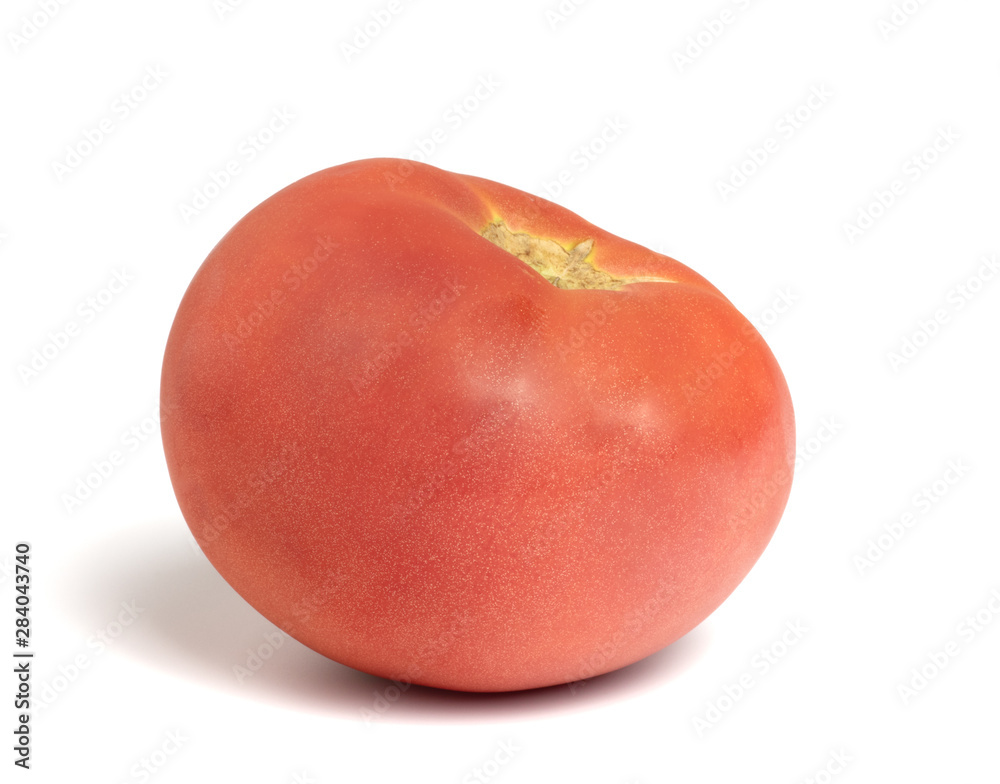 ripe red tomato lies on a white background ripe red tomato lies on a white background
