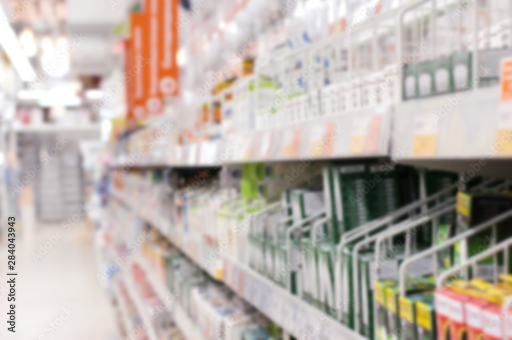 hardware store blur background. Blurred colorful goods on shelves
