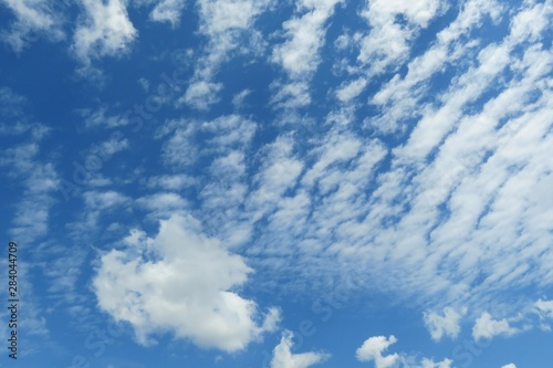 Beautiful cumulus clouds in blue sky  natural background