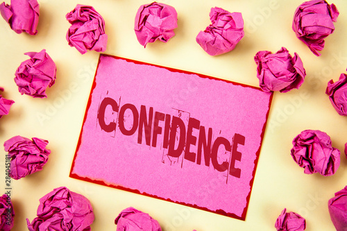 Writing note showing Confidence. Business photo showcasing Never ever doubting your worth, inspire and transform yourself written Pink Sticky Note Paper plain background Pink Paper Balls.