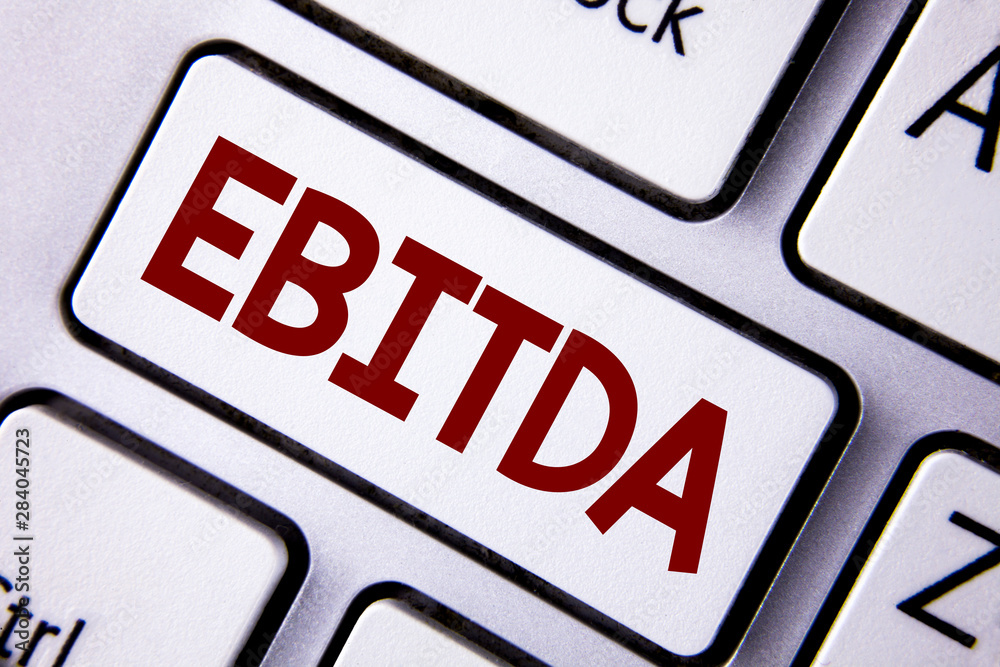 Word writing text Ebitda. Business concept for Earnings before tax is measured to evaluate company performance written White Keyboard Key with copy space. Top view. Word writing text Ebitda. Business concept for Earnings before tax is measured to evaluate company performance written White Keyboard Key with copy space. Top view.