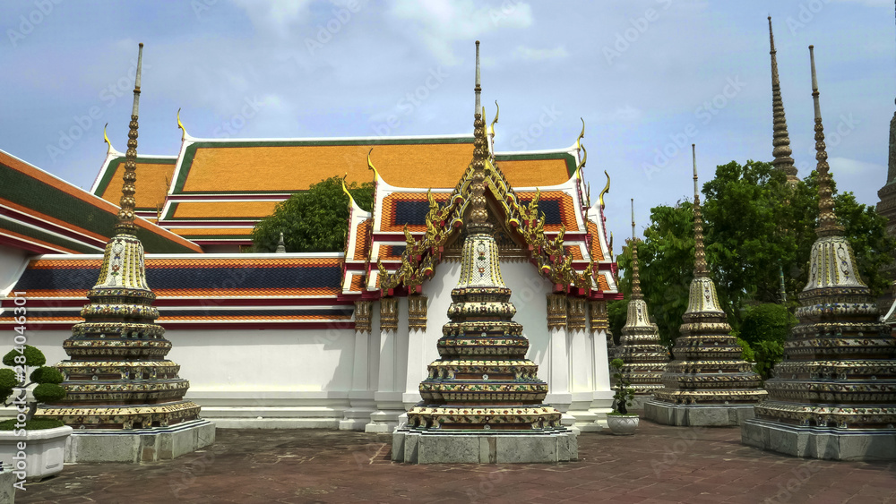 several stupa at wat pho temple in bangkok