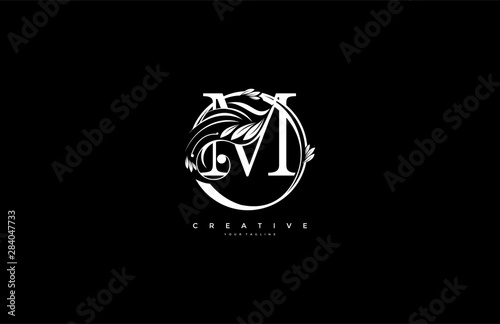 initial M letter linked rounded shape luxury flourishes ornament logo-01