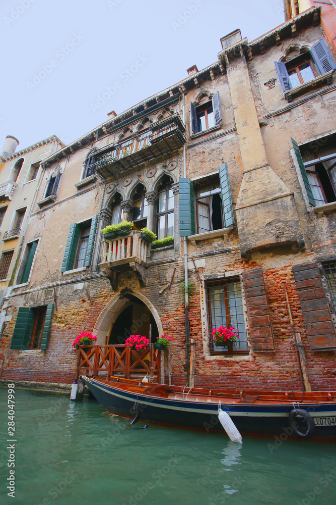 Picturesque building on a canal in venice