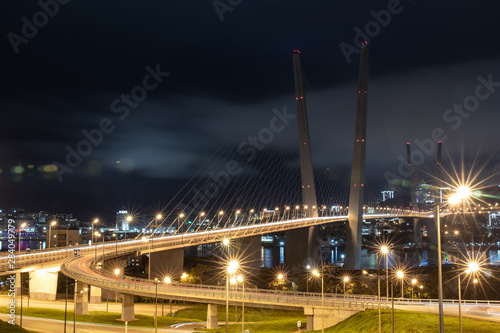 Golden Bridge in Russian city Vladivostok at night on longexposure 