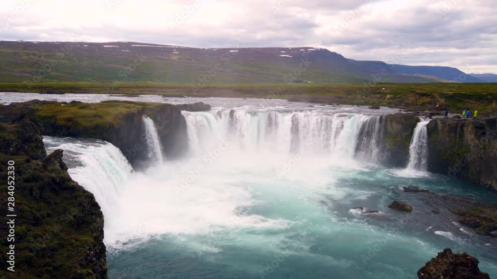Beautiful 12 meter/39 feet high Godafoss Waterfall in the river Skjálfandafljót in north Iceland, wide static from above 4k ProRezHQ Beautiful 12 meter/39 feet high Godafoss Waterfall in the river Skjálfandafljót in north Iceland, wide static from above 4k ProRezHQ