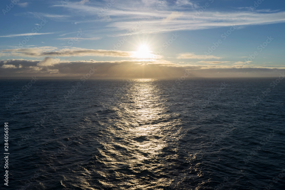 Naklejka premium Sunset on the Norwegian Sea off the coast of Norway