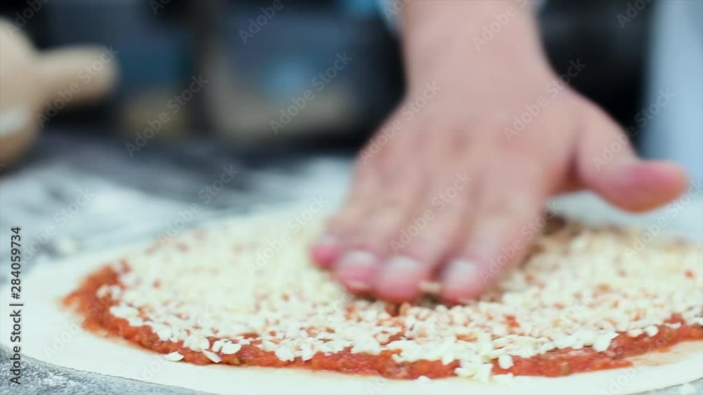 Pizza Making Process in slow motion and normal shot Pizza Making Process in slow motion and normal shot
