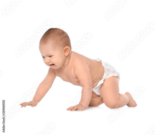 Cute little baby crawling on white background