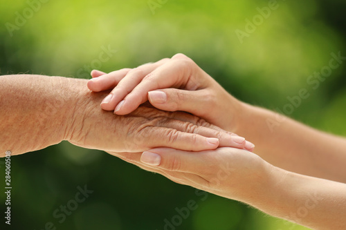 People, care and support. Giving helping hand concept