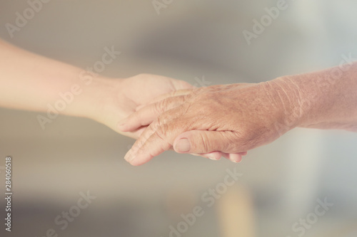 People, care and support. Giving helping hand concept