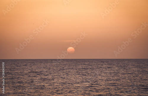 Fototapeta Naklejka Na Ścianę i Meble -  Sunset by the beach summer background