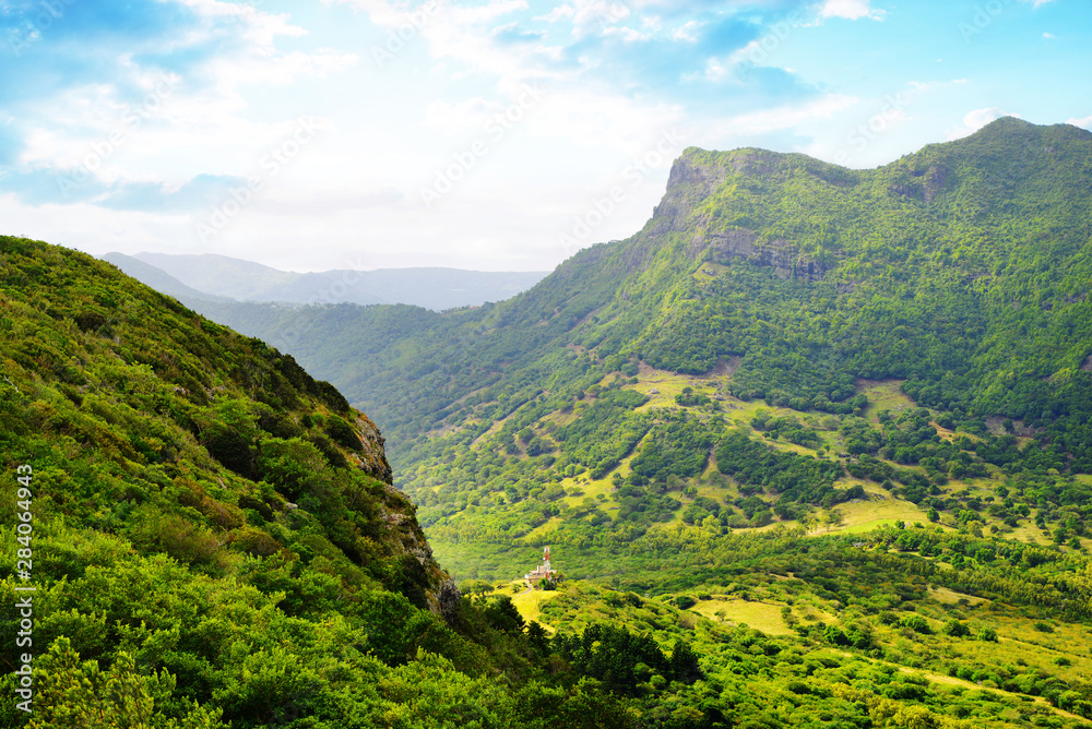 Plakat View on the highest mountain of Mauritius island ( Piton de la petite riviere noire ) from Le Morne Brabant.