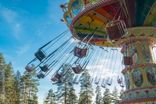 Kouvola, Finland - 10 August 2019: Ride Swing Carousel in motion in amusement park Tykkimaki.
