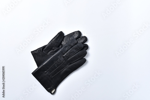Mens black gloves on a white background