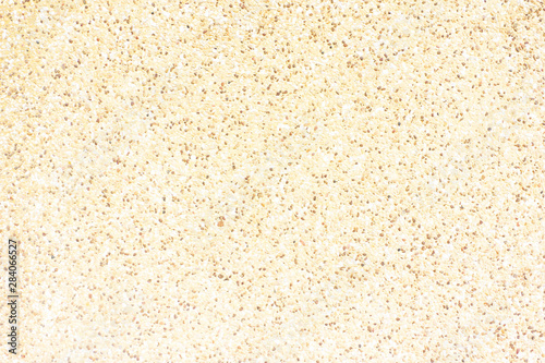 Cream wall sand texture background rough surface.