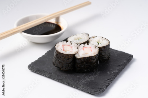 Mix sushi set, Japanese food on slate platte isolated white background