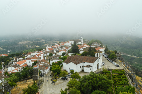 The picturesque village is located on top of a high mountain.