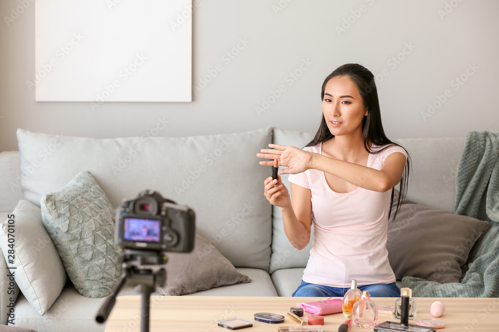 Asian beauty blogger recording video at home Asian beauty blogger recording video at home