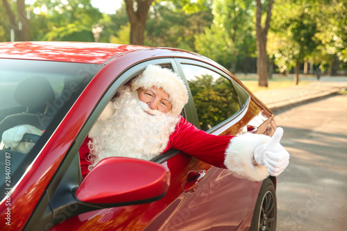 Santa Claus showing thumb-u...