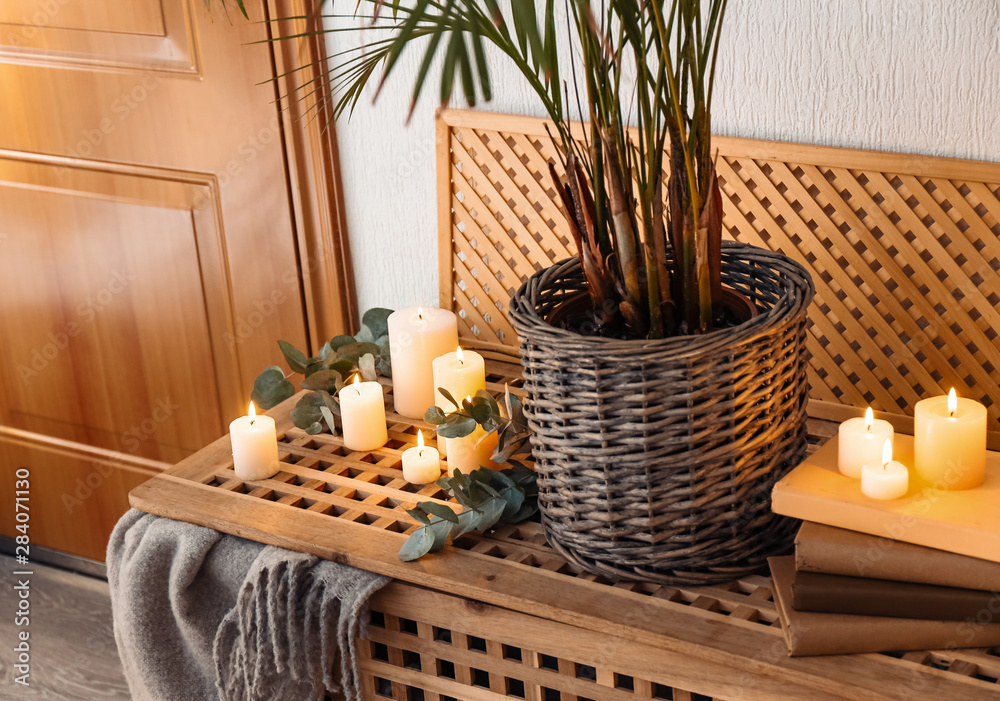 Interior of room with beautiful burning candles