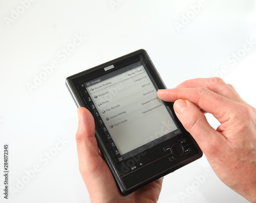 Male hand with ebook