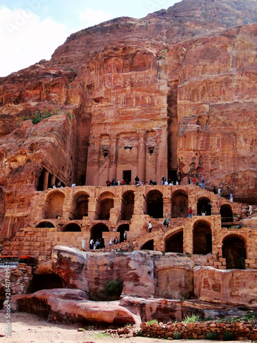 Tourists visit Petra in Jordan, UNESCO World Heritage Site, a historical archaeological park and Nabataean caravan-city with caves, temples, and tombs reveal human civilization.