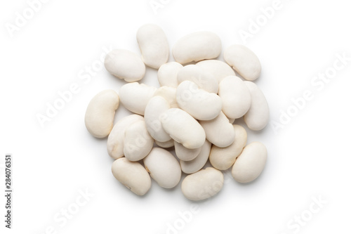 Pile of white kidney beans isolated on white background. Top view.