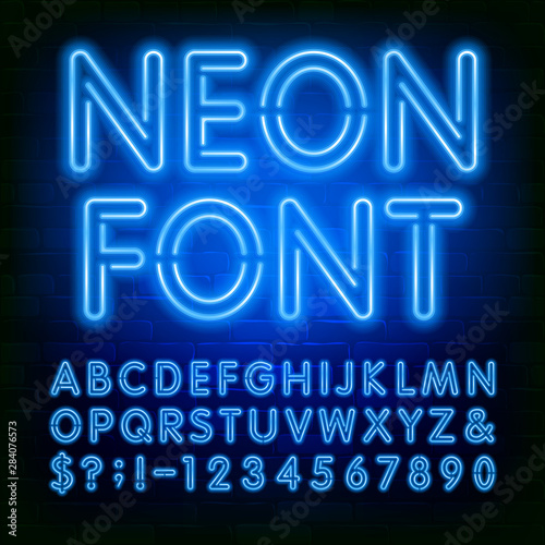 Neon alphabet font. Blue neon light bulb letters and numbers on brick wall background. Stock vector typeface for your typography design.