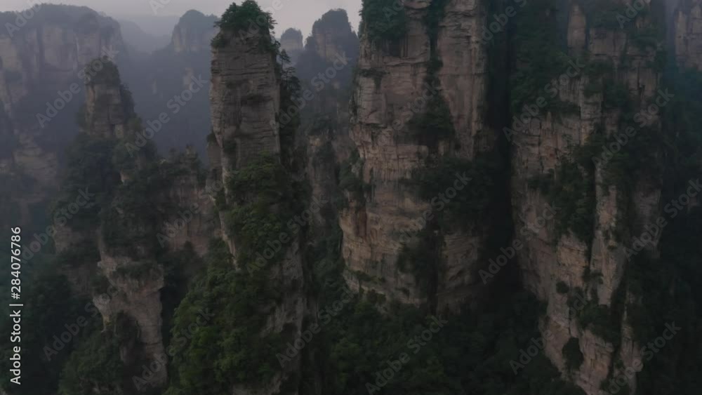 Drone shot of Zhangjiajie national park in China, karst mountains all over the place