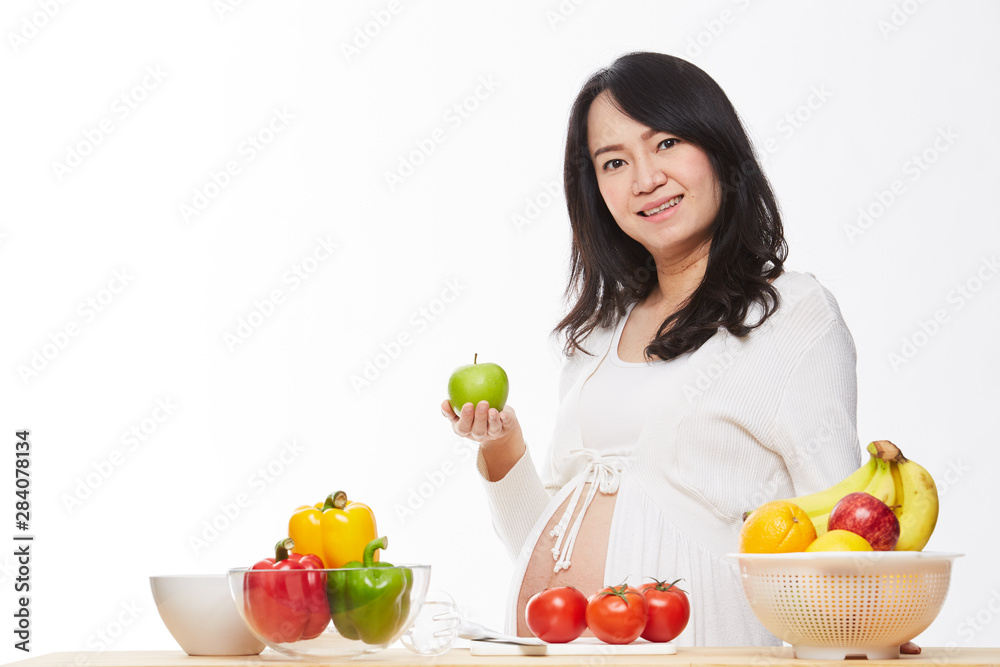Belly women prepare food on the table. Belly women prepare food on the table.