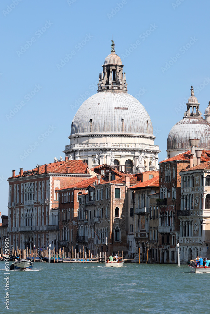 dome of Madonna della Salute and boats in Venice