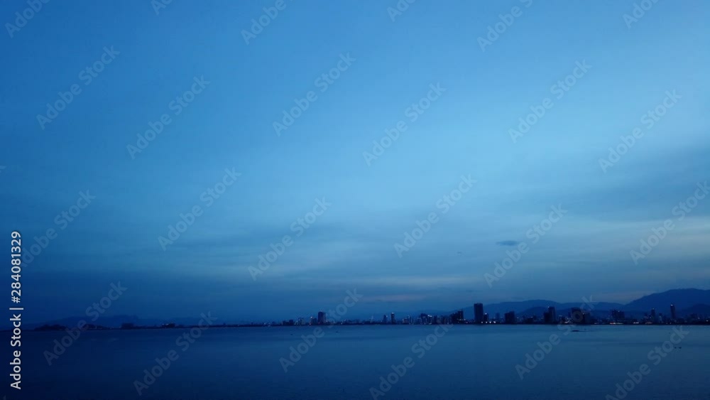 Timelapse of coastal view of Danang City from south Chinese sea during the dusk night is coming soon Timelapse of coastal view of Danang City from south Chinese sea during the dusk night is coming soon