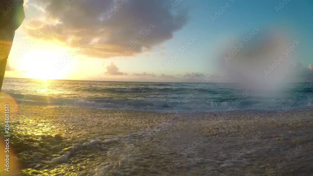 Waves at Sunset on a beach on the North Shore of Oahu, Hawaii Waves at Sunset on a beach on the North Shore of Oahu, Hawaii