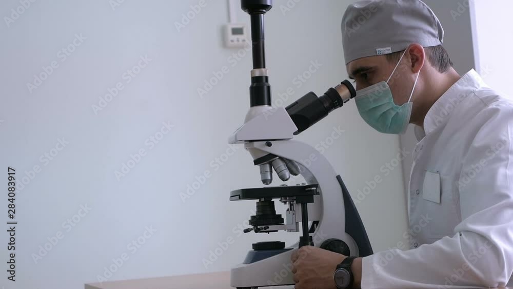 close-up doctor leafing through a medical history disease treatment therapy