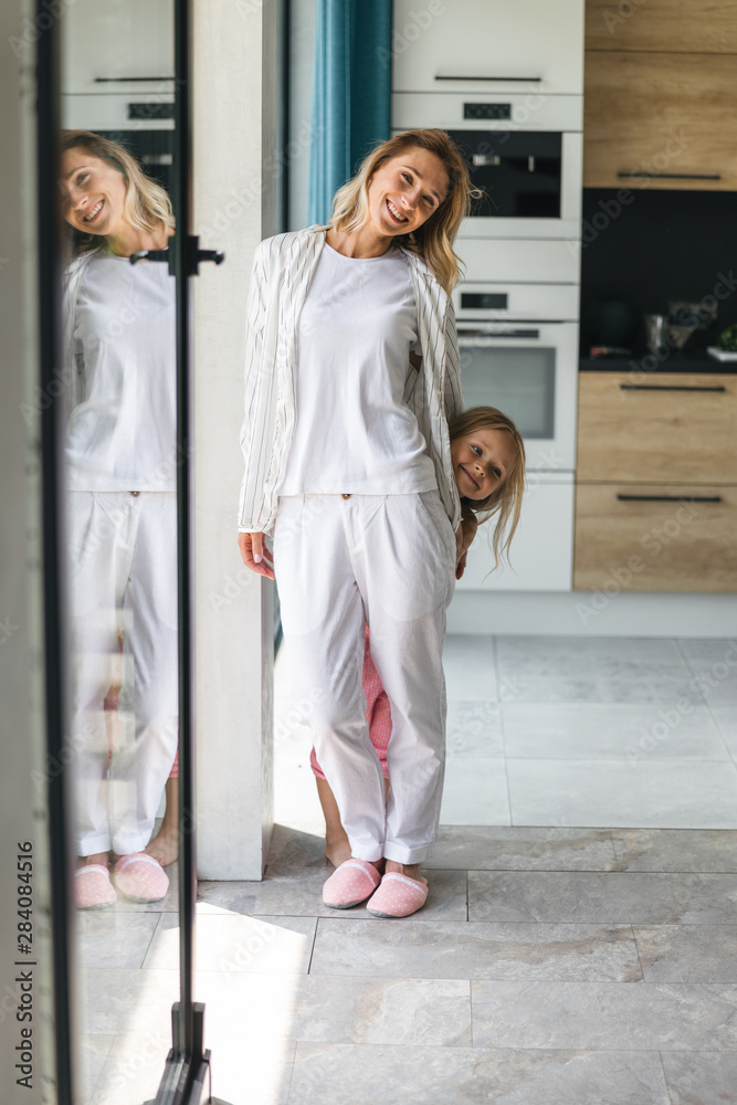 Home sweet home for mom and daughter stock photo Home sweet home for mom and daughter stock photo