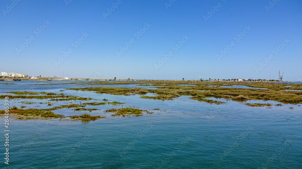 Faro city and natural park Ria Formosa in the south of Portugal Faro city and natural park Ria Formosa in the south of Portugal