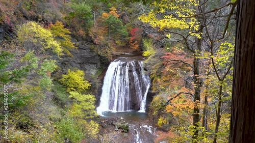 Waterfall in Yokoya gorge in Chino, Nagano during autumn photo